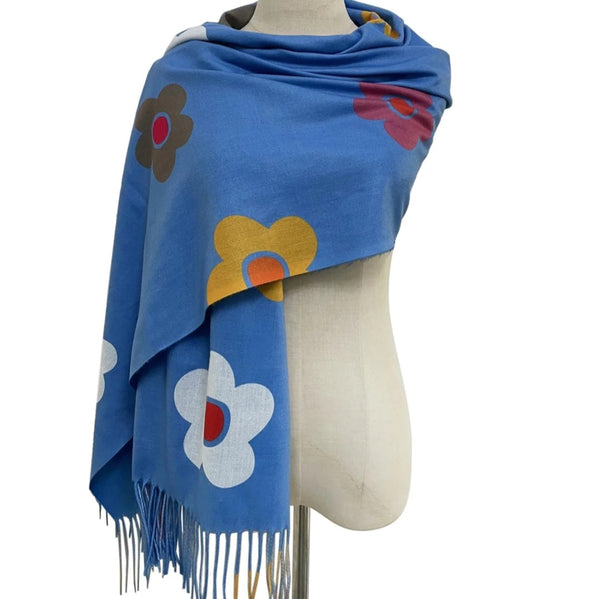 Colourful daisies on a vibrant blue scarf