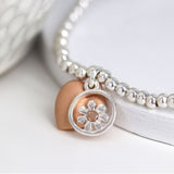 Sterling silver daisy & heart bracelet