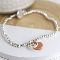 Sterling silver daisy & heart bracelet