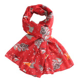 Foxes, deer, robins in the snow on a red scarf