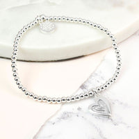 Silver plated grey enamel heart inset bracelet