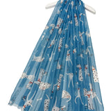 Dalmation dogs on a blue scarf