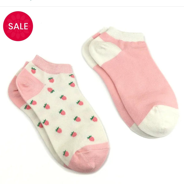 Pink & cream strawberry trainer sock duo. One strawberry pair & one plain pair.