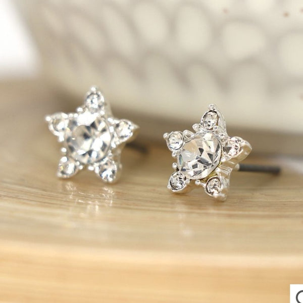 Silver plated star flower stud earrings